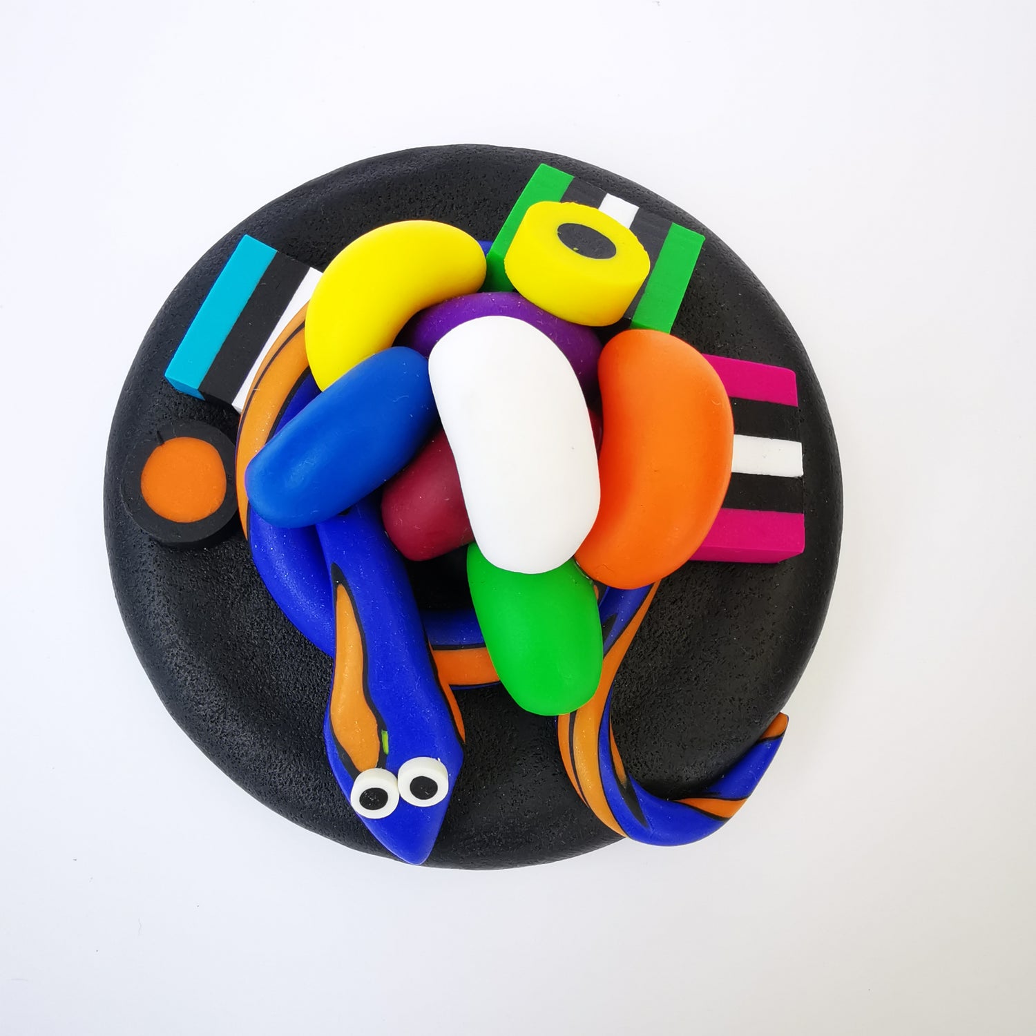 Extra-large glass treat jar hand-decorated in New Zealand, with an air-tight lid decorated with colourful polymer clay licorice allsorts, jelly beans and a pink snake. Perfect for the whole family or as a gift for Nana or Granddad.