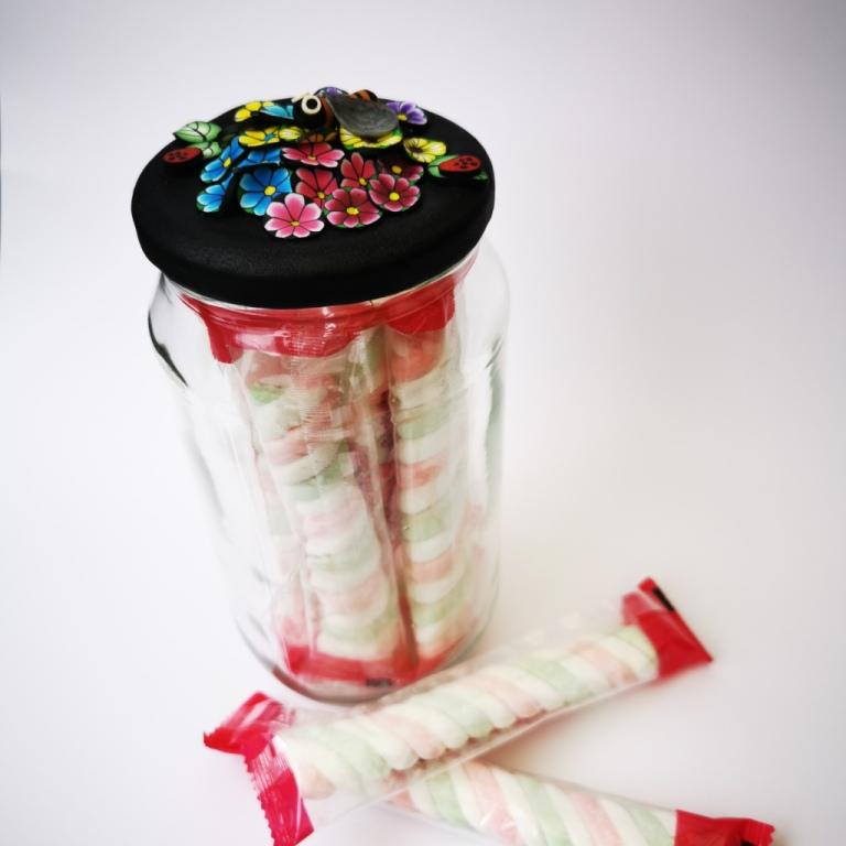 Extra-large glass treat jar hand-decorated in New Zealand, with  an air-tight lid decorated with pretty, colourful, polymer clay flowers and 2 cute bees. Perfect for sharing and as a gift for Nana.