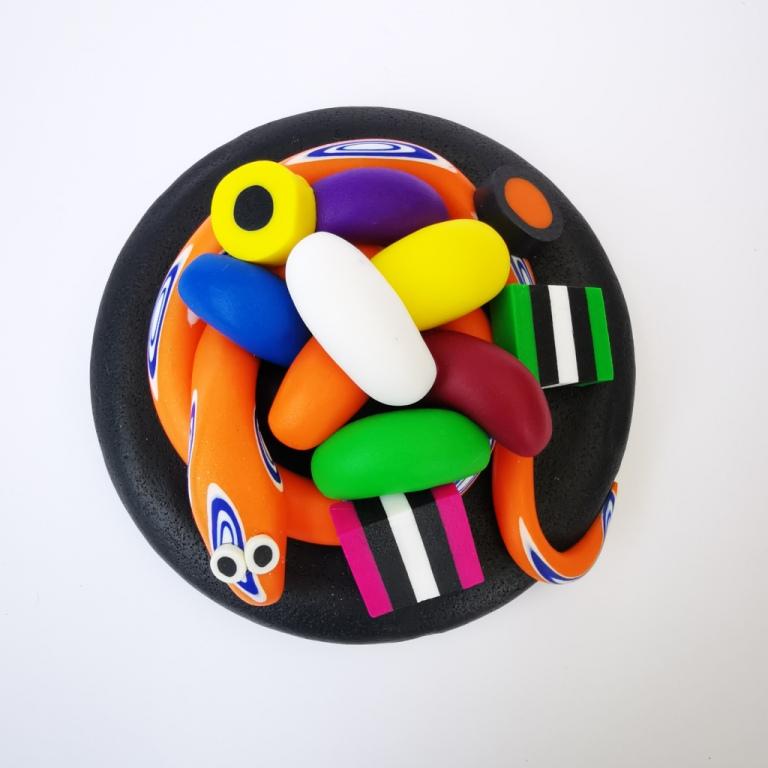 Extra-large glass treat jar hand-decorated in New Zealand, with an air-tight lid decorated with colourful polymer clay licorice allsorts, jelly beans and a orange snake. Perfect for the whole family or as a gift for Nana or Granddad.