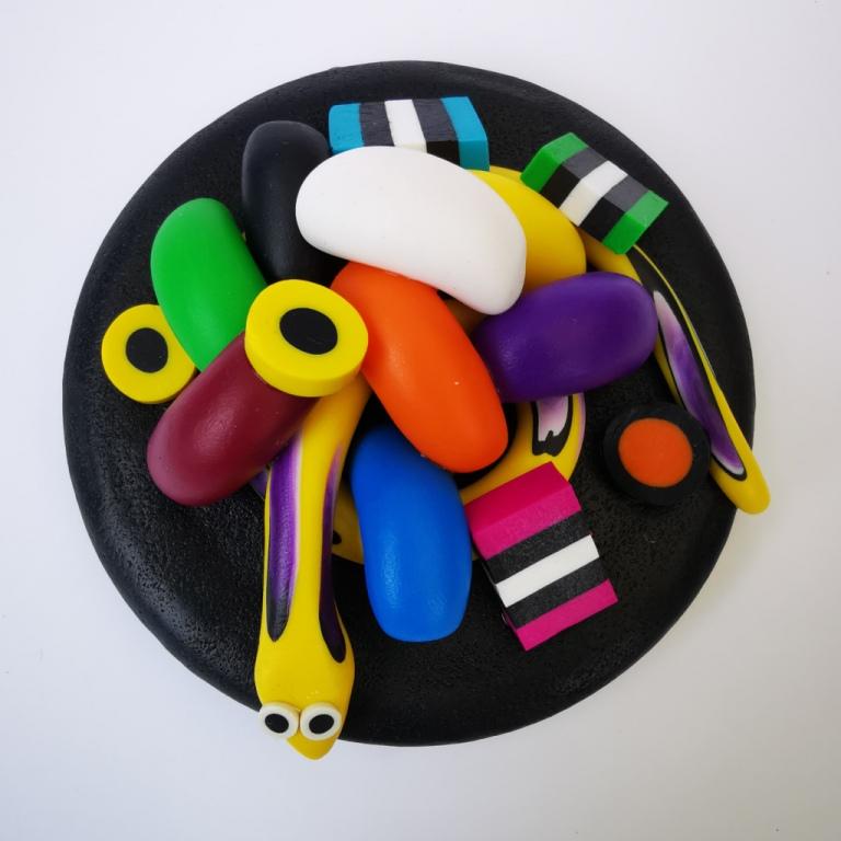 Extra-large glass treat jar hand-decorated in New Zealand, with an air-tight lid decorated with colourful polymer clay licorice allsorts, jelly beans and a yellow snake. Perfect for the whole family or as a gift for Nana or Granddad.