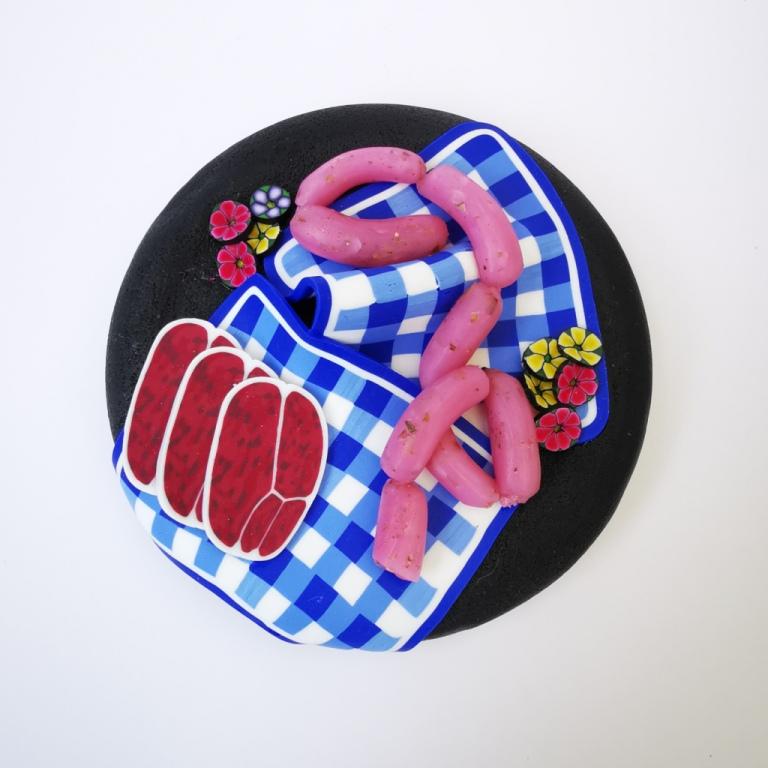 Square Dog glass treat Jar hand-decorated in New Zealand,  with  blue WOOF on the front and a polymer clay decorated air-tight lid, including a blue tablecloth, miniture sausages and steak as a gift for that special dog