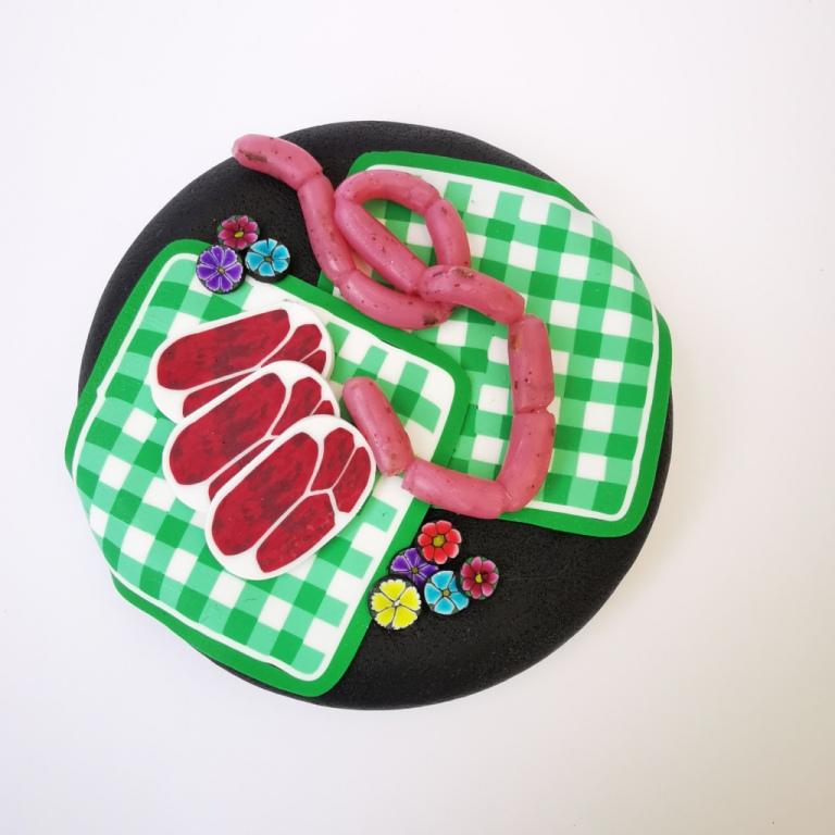 Round Dog glass treat Jar hand-decorated in New Zealand,  with  green WOOF on the front and a polymer clay decorated air-tight lid, including a green tablecloth, miniture sausages and steak as a gift for that special dog