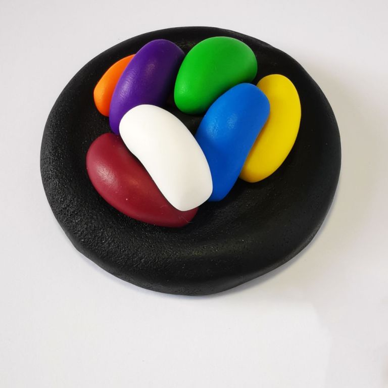 270ml glass hexagonal lolly jar hand-decorated in New Zealand, with  an air-tight lid decorated with polymer clay jelly beans. Filled with jelly beans