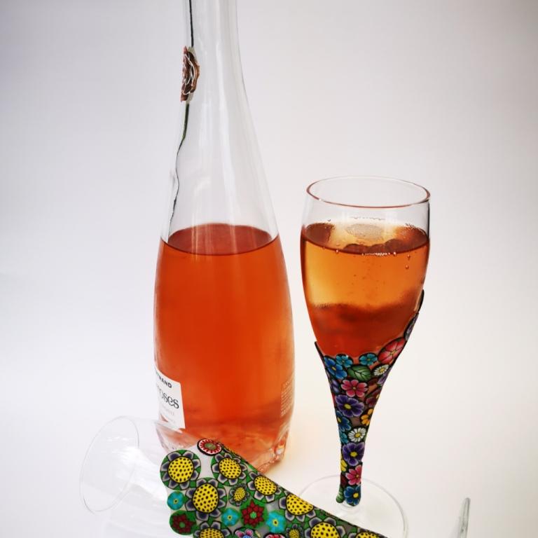 Champagne flute wine glass hand-decorated in New Zealand,  with a polymer clay veneer of pretty, colourful,  flowers for a gift, wedding or special birthday.
