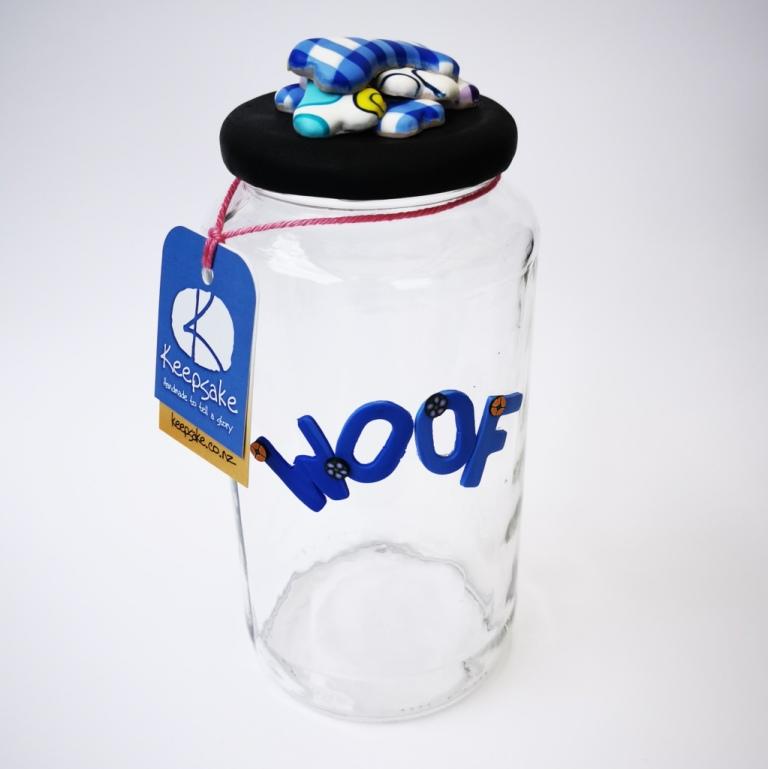 Round Dog glass treat Jar hand-decorated in New Zealand,  with a polymer clay WOOF on the front, and a pile of  funky brightly decorated polymer clay bones on the air-tight lid, ideal as a gift for that special dog