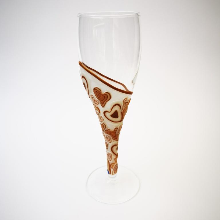 Champagne flute wine glass hand-decorated in New Zealand,  with a  polymer clay veneer of gold hearts for a gift, wedding or special birthday.