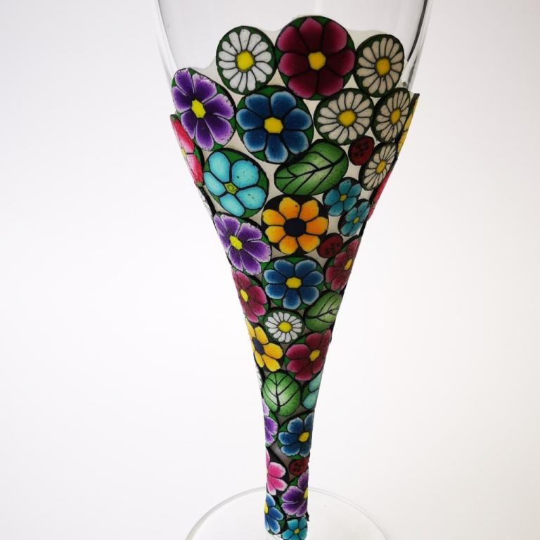 Champagne flute wine glass hand-decorated in New Zealand,  with a polymer clay veneer of pretty, colourful,  flowers for a gift, wedding or special birthday.